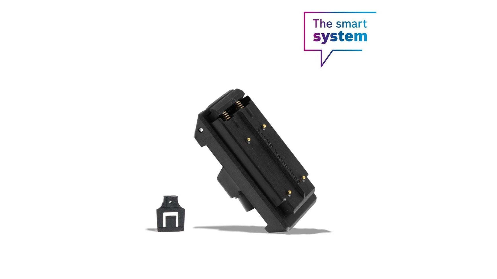 Eine schwarze BOSCH Display-Aufnahme hinten und eine passende Kiox 300 Komponente sind auf weißem Hintergrund zu sehen. In der rechten oberen Ecke steht in einer Sprechblase: "Das smarte System.