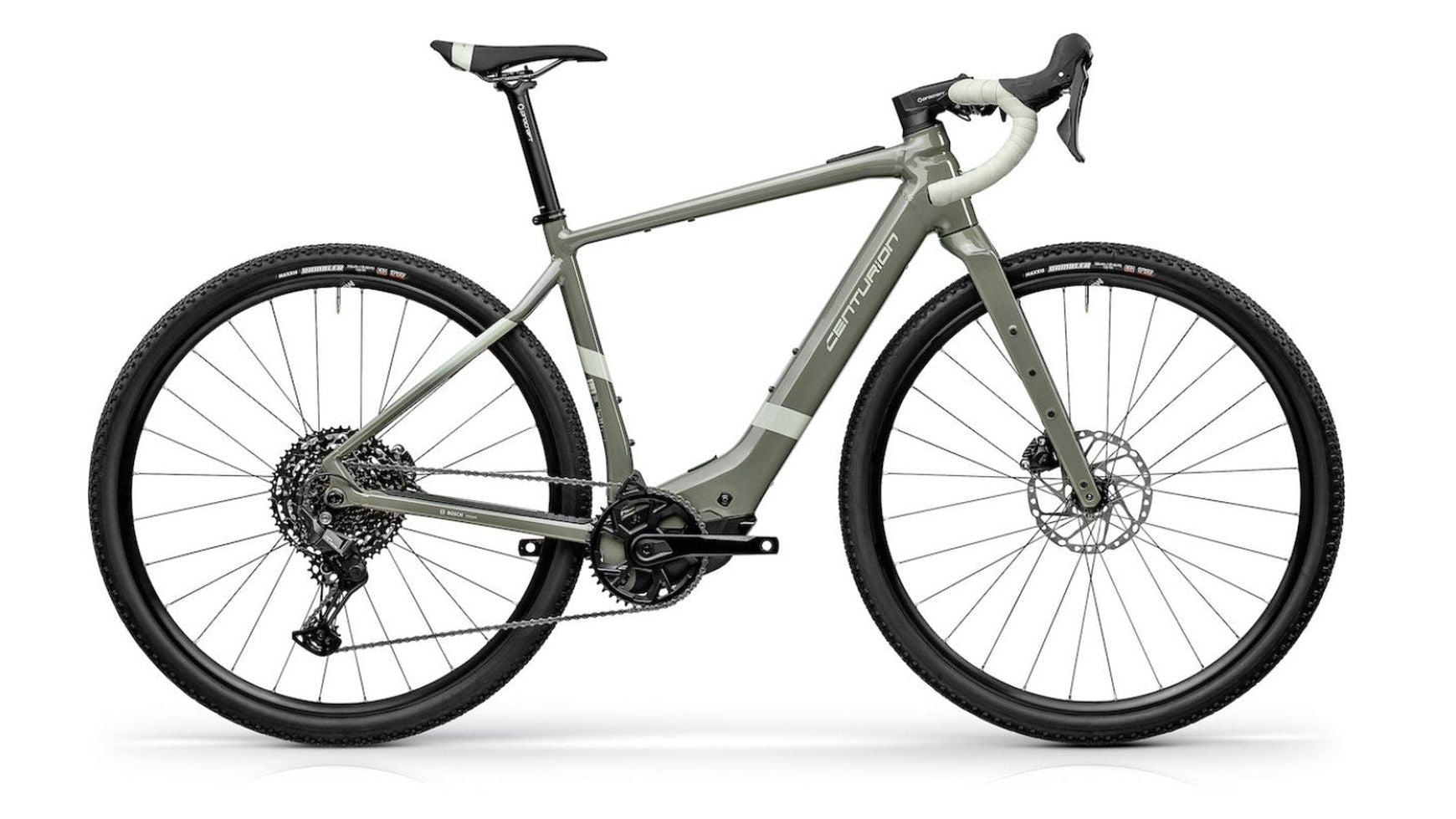 Das CENTURION Centurion Crossfire R1000 D EP1 ist ein graues Gravel-E-Bike mit Bosch SX-Motor, tiefgezogenem Lenker, geländegängigen Reifen, Scheibenbremsen und einem schlanken Rahmen mit PowerTube 400 Wh Akku, der seitlich vor weißem Hintergrund abgebildet ist.