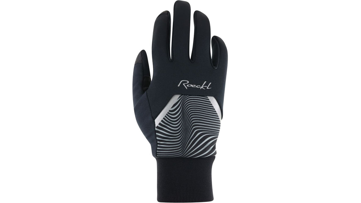 Der Roeckl Wirsberg Winterradhandschuh besticht durch sein schwarzes Design mit weißem Wellenmuster und ROECKL-Branding, Rippenbündchen am Handgelenk und PrimaLoft Gold Isolierung für Wärme. Abgebildet mit der Handfläche nach außen.