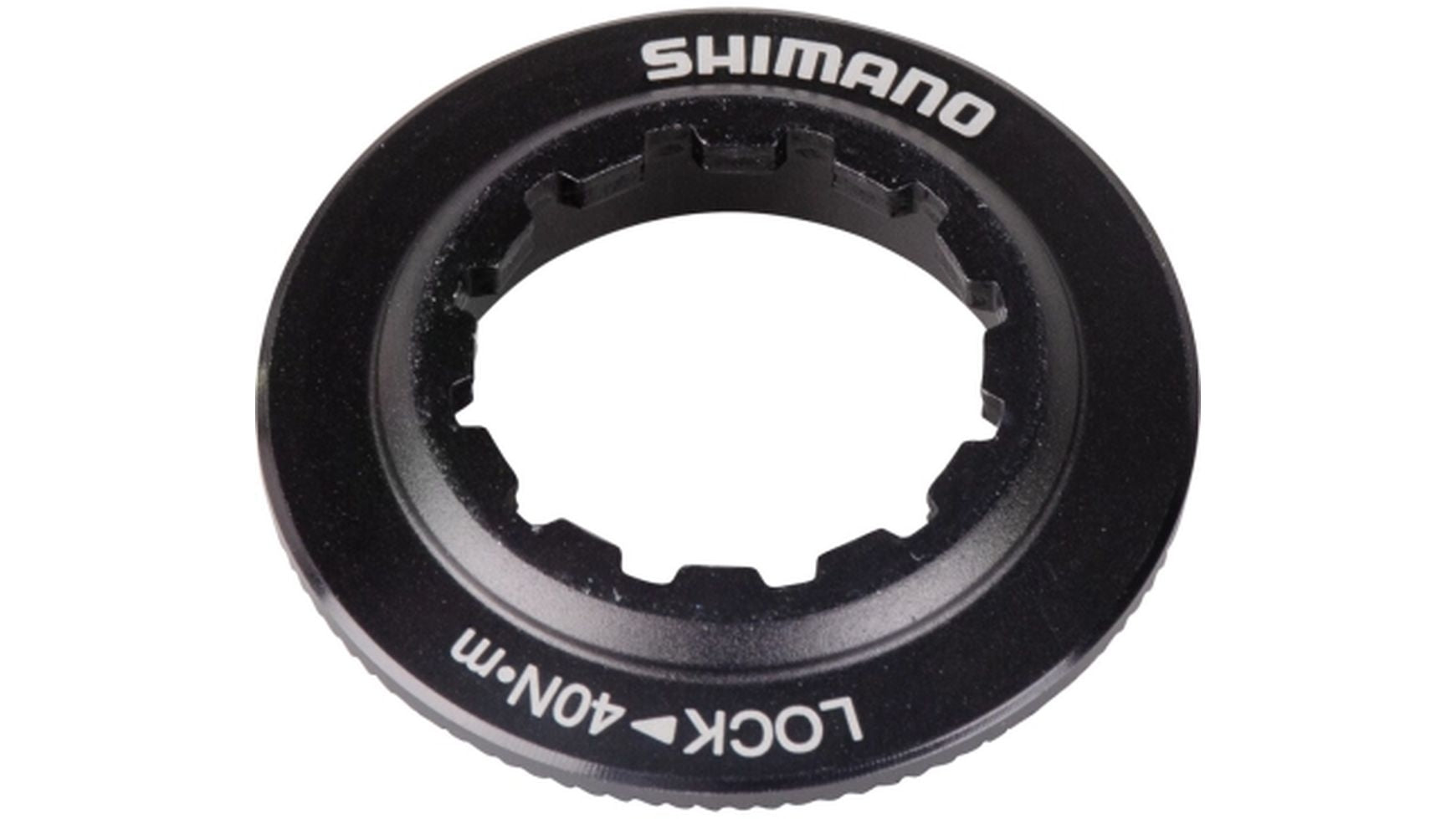 Ein schwarzer Shimano SM-RT81/SM-RT67 Verschluss mit Innenverzahnung und weißem "SHIMANO"- und "LOCK 40N-m"-Schriftzug auf der Oberseite, entwickelt für die effiziente Sicherung von Bremsscheiben.