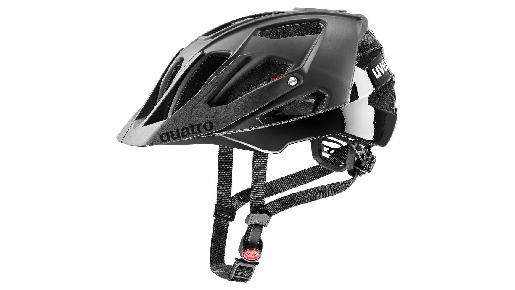 Der UVEX Uvex Quatro CC MTB-Helm in Schwarz verfügt über Double-Inmould-Technologie, mehrere Belüftungsöffnungen, verstellbare Riemen, ein seitliches Einstellrad zur Passformanpassung, ein verstellbares Visier und das Quatro CC Label an der Seite.
